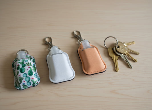 Hand sanitizer key chain.  Refillable bottle.